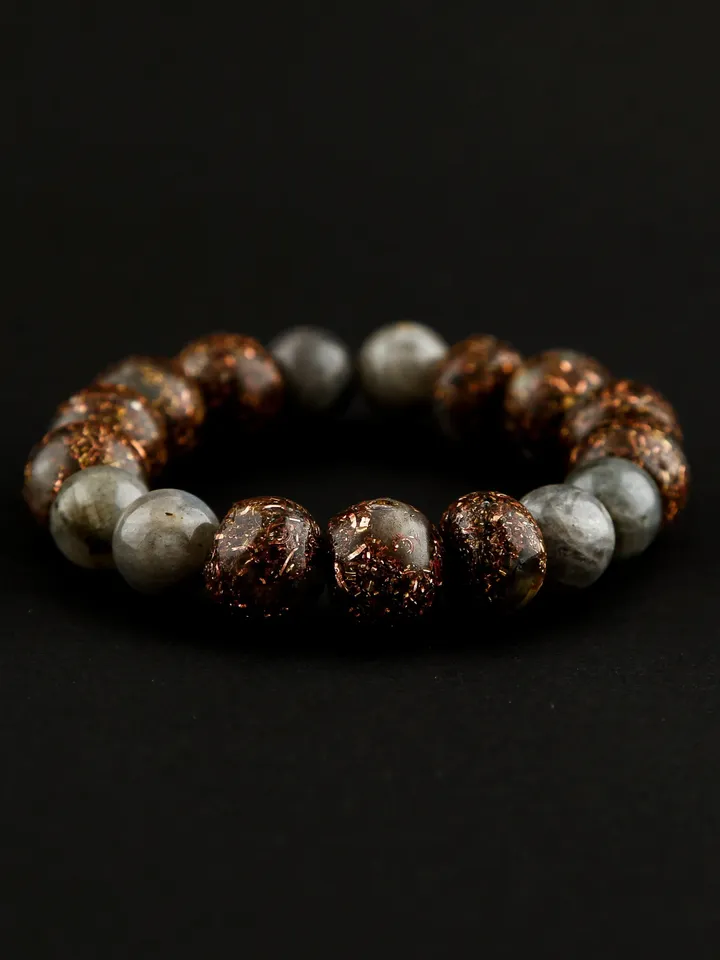 Orgonite medium gray labradorite, mystical, psychic bracelet. The power of labradorite is increased with incense and Tibetan singing bowls.