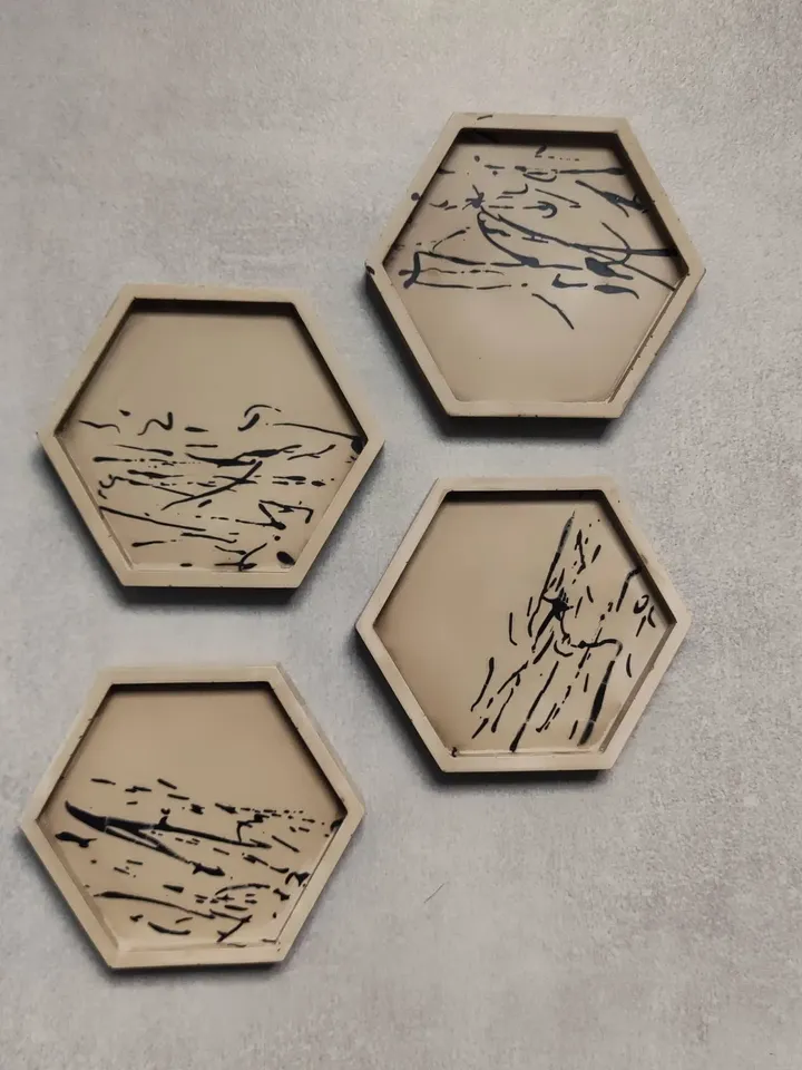 Jesmonite hexagonal trays / coasters with splashes in greige