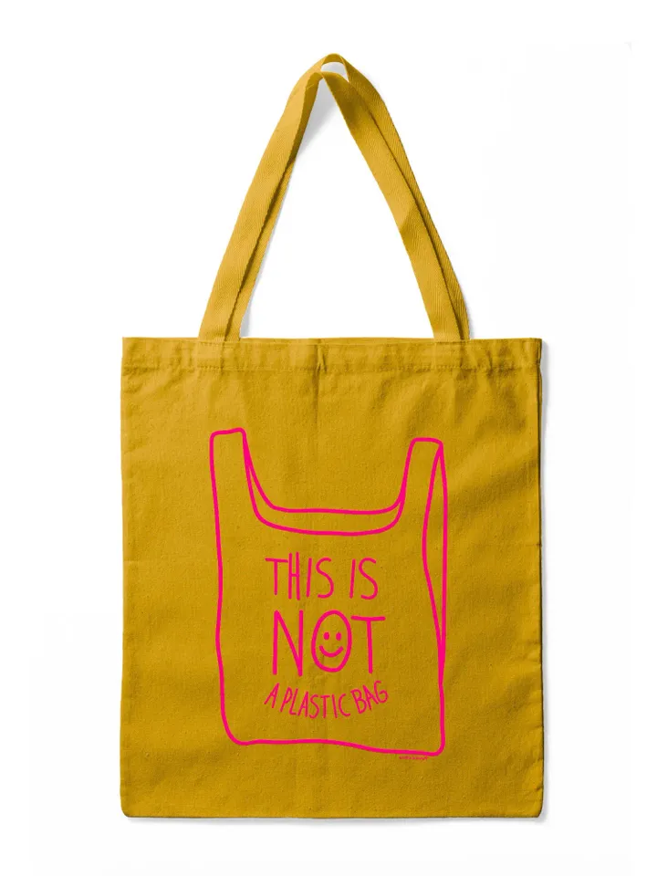 NOT A PLASTIC tote Mustard is a eco vegan friendly reusable grocery bag, market bag, gym bag. Say No to Plastic with this anti plastic tote.