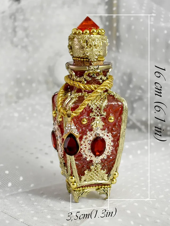 Red glass bottle for perfumes or aromatic oils dressing table decoration
