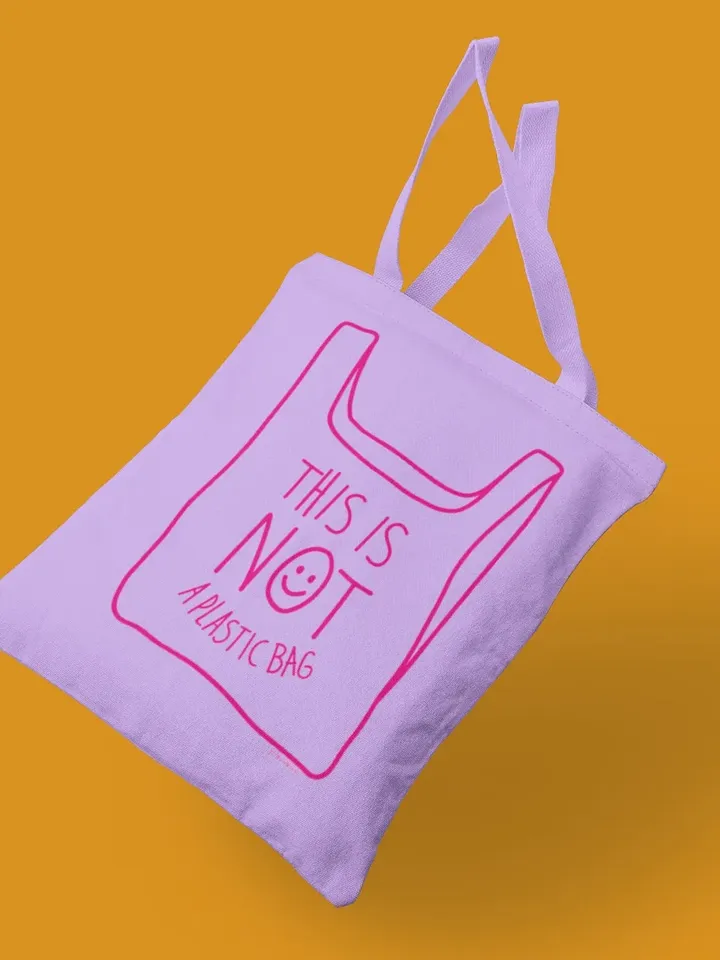 NOT A PLASTIC tote lila is a eco vegan friendly reusable grocery bag, market bag or gym bag. Say No to Plastic with this anti plastic tote.