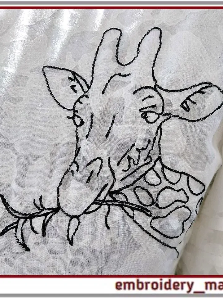 Muzzle of a giraffe with a branch Machine embroidery design