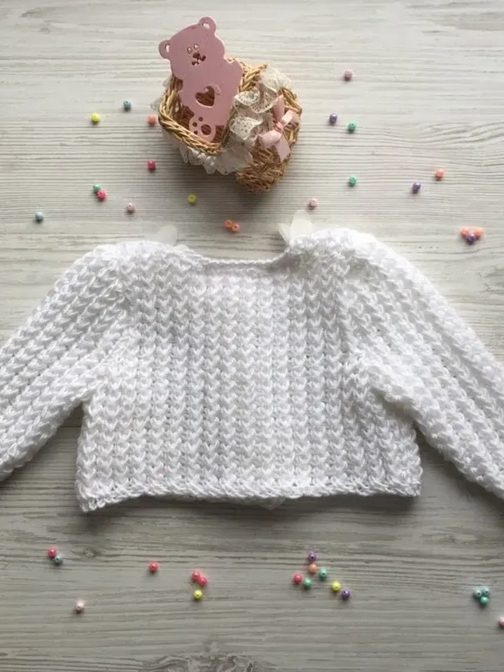 Knit jacket for baby girl. White knit jacket with 3d flowers for baby girl.