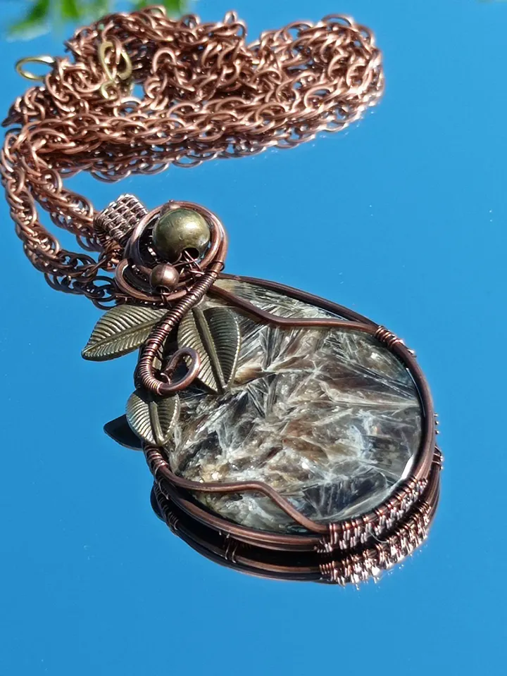 A catchy fancy pendant with a rare stone, an anniversary gift, a gift to yourself. Pendant for a dresses occasions