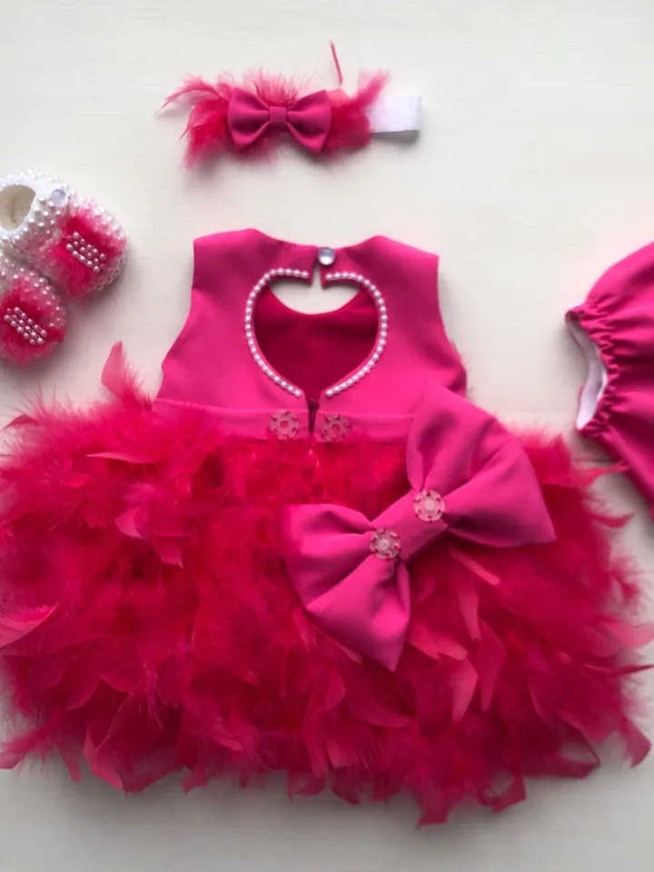 Fuchsia dress with feathers and pearls, booties, panties and headband. First birthday dress. Flower girl dress. Take home outfit for girl.