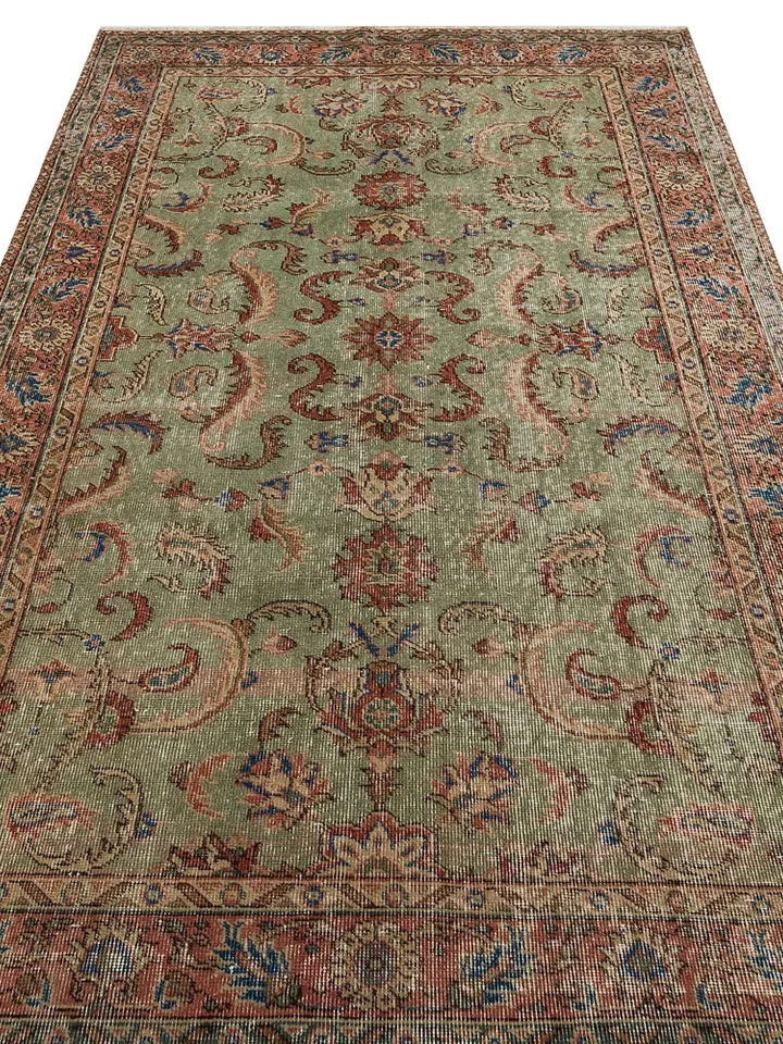 Elevate your decor with a unique 5x8 ft vintage green Turkish rug - handwoven to perfection for a touch of timeless elegance!