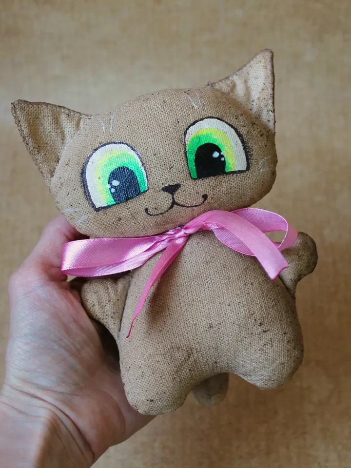 Star - coffee cat - a symbol of the new year in a gift box