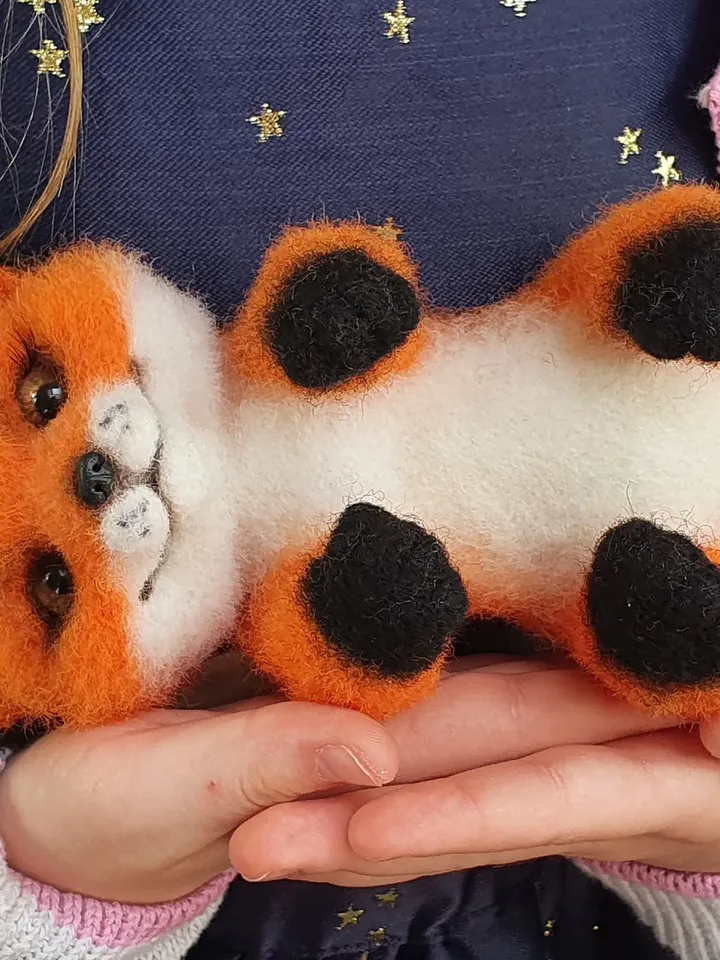 Small fox-girl of dry felting. Fox for decorating a room. A toy made of natural wool.