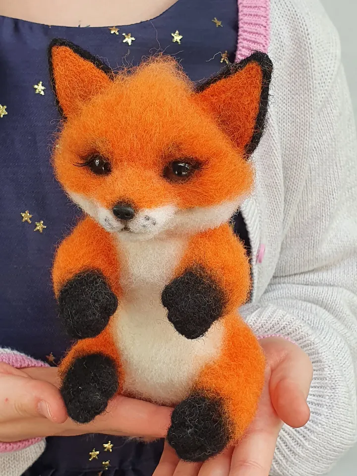 Small fox-girl of dry felting. Fox for decorating a room. A toy made of natural wool.
