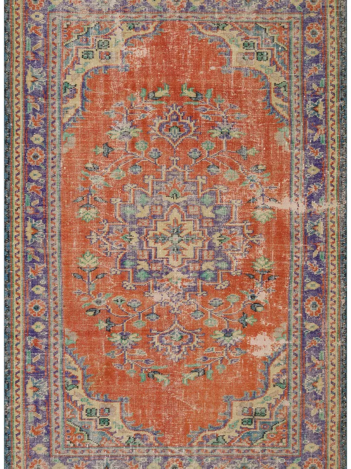 Add a pop of color to your living room with this stunning Orange Turkish Rug