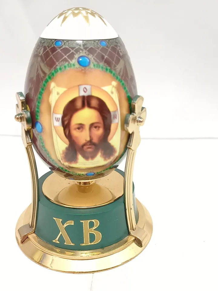 Decorative Easter egg with the image of Jesus Christ and Cyrillic letters ХВ Ukrainian souvenir