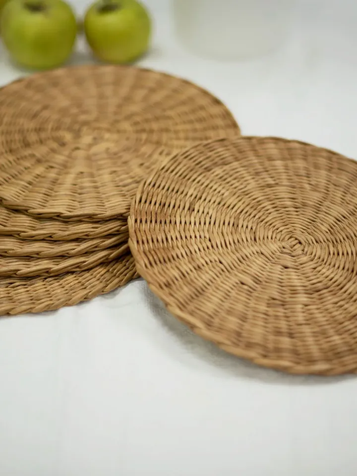 6 round wicker placemats for serving the dining table. Set of handmade mats for table decor
