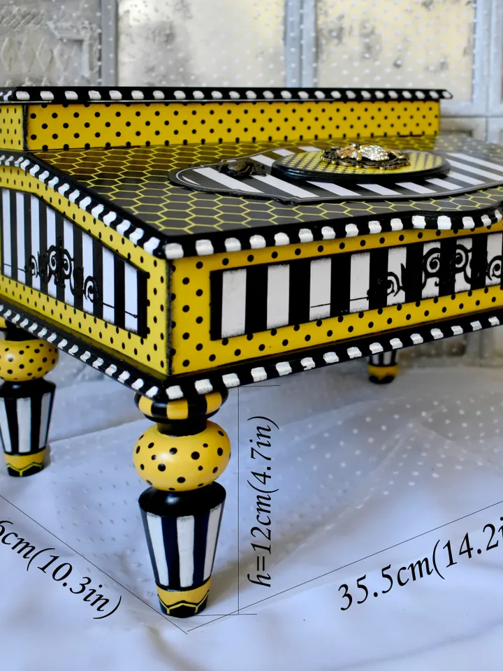 Bureau for papers and documents in black-white-yellow color