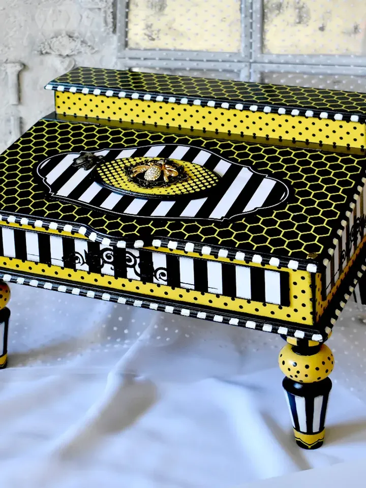 Bureau for papers and documents in black-white-yellow color