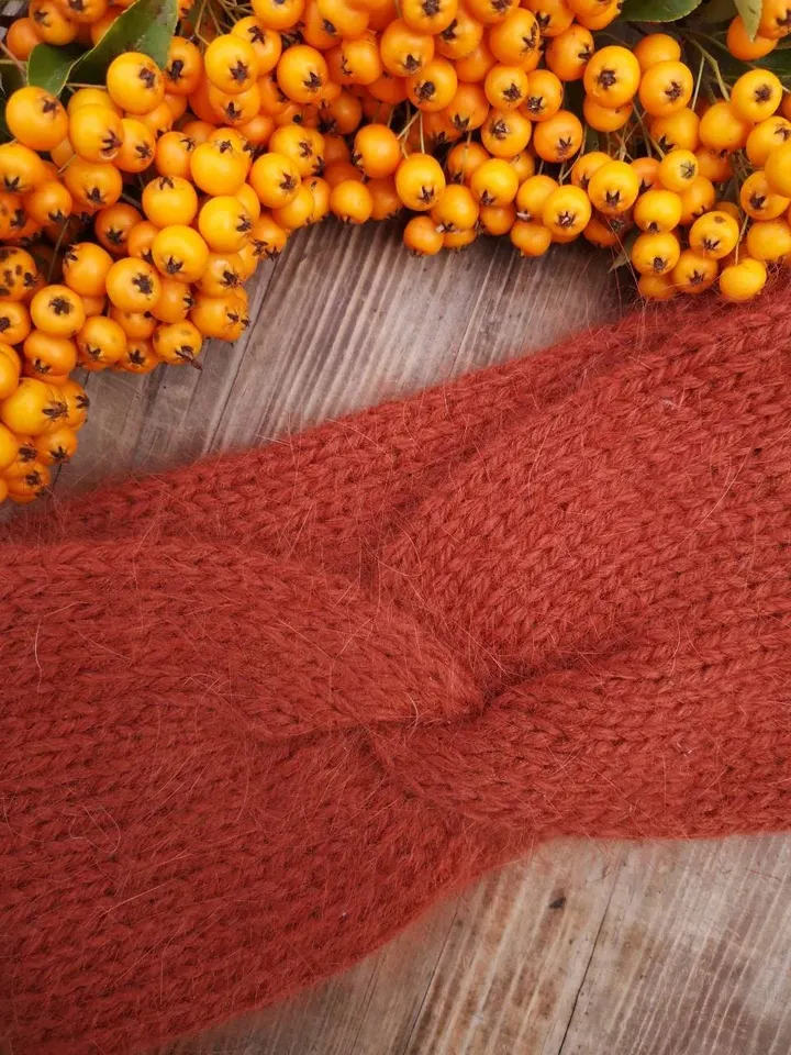 Warm, soft and fluffy women twisted headband, red bricks colour, made from natural, quality yarn.