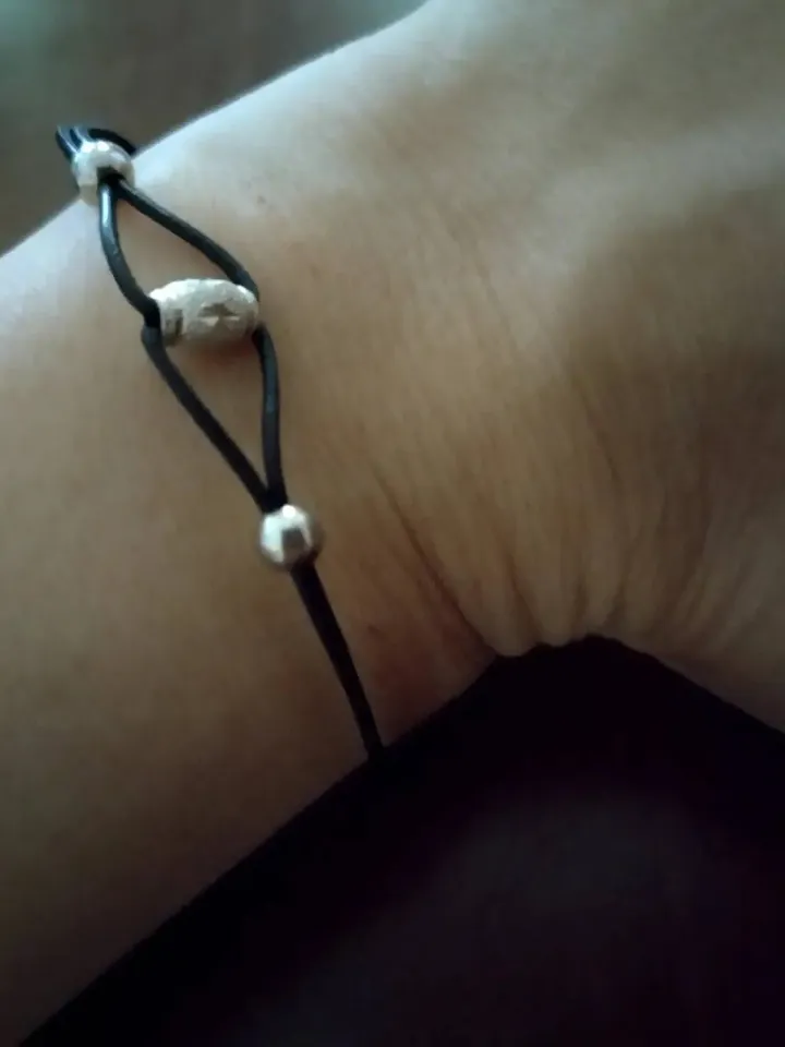 Bracelet in silver and leather.