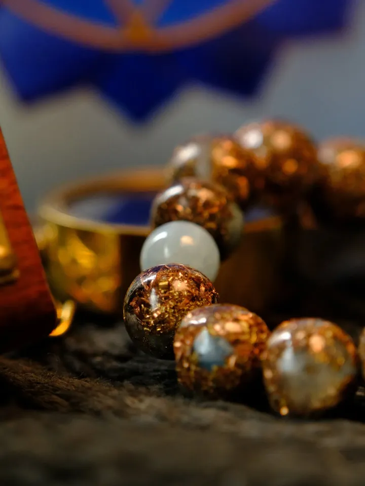 Orgonite aquamarine, serenity, throat chakra bracelet. The power of aquamarine is increased with incense and Tibetan bowls.