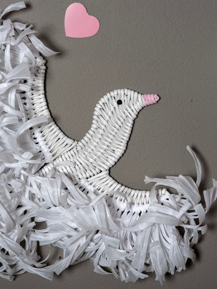 Two white doves handmade. Hanging birds with white raffia for wall decor.