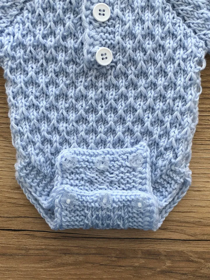 Blue knit romper, hat and booties for baby boy. Photo props for baby boy. Take home outfit for boy.