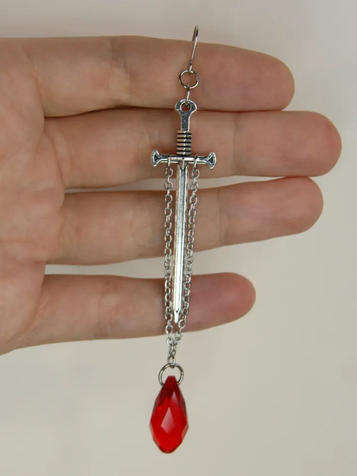 Single sword earring with red crystal Double piercing anime earring with chain Goth sword earring transforming