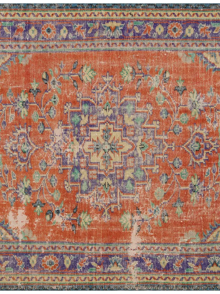 Add a pop of color to your living room with this stunning Orange Turkish Rug