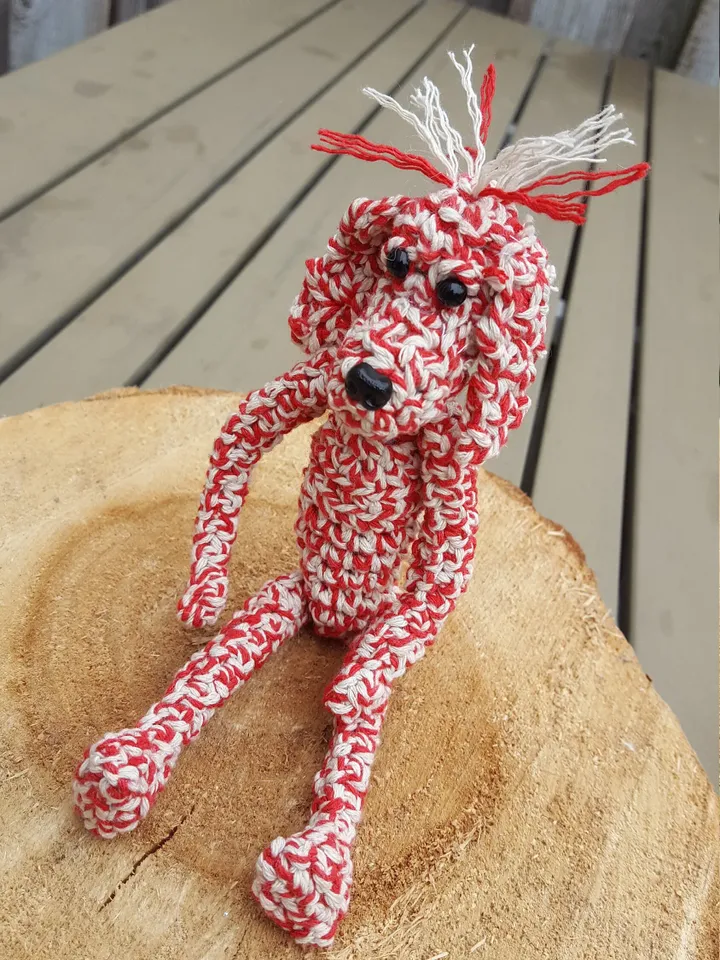 Fantasy crochet doggy, glass eyelets, plastic cream, melee