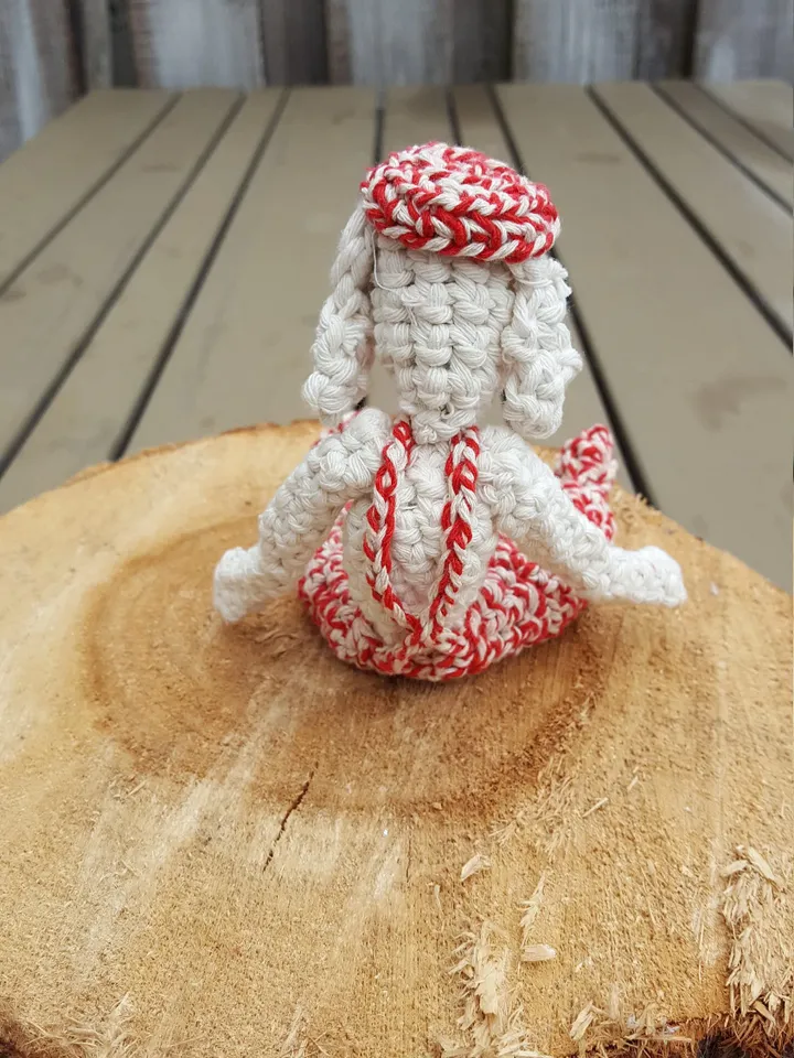 Crochet fantasy doggy of cotton, plastic eyelets and cream, mixed