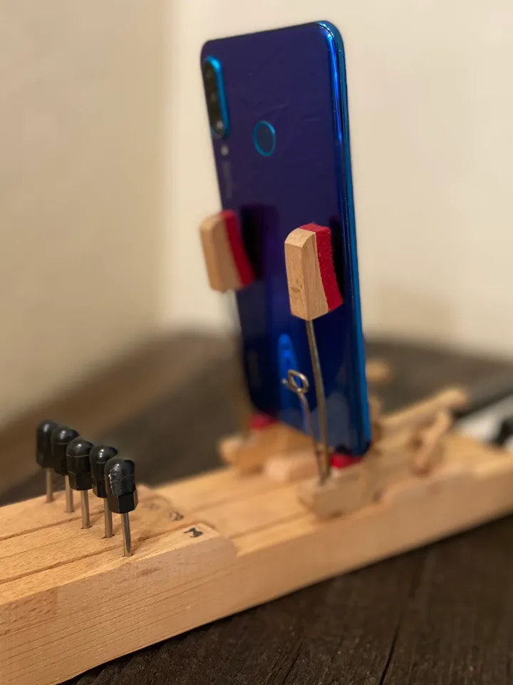 Phone stand made from old piano keys