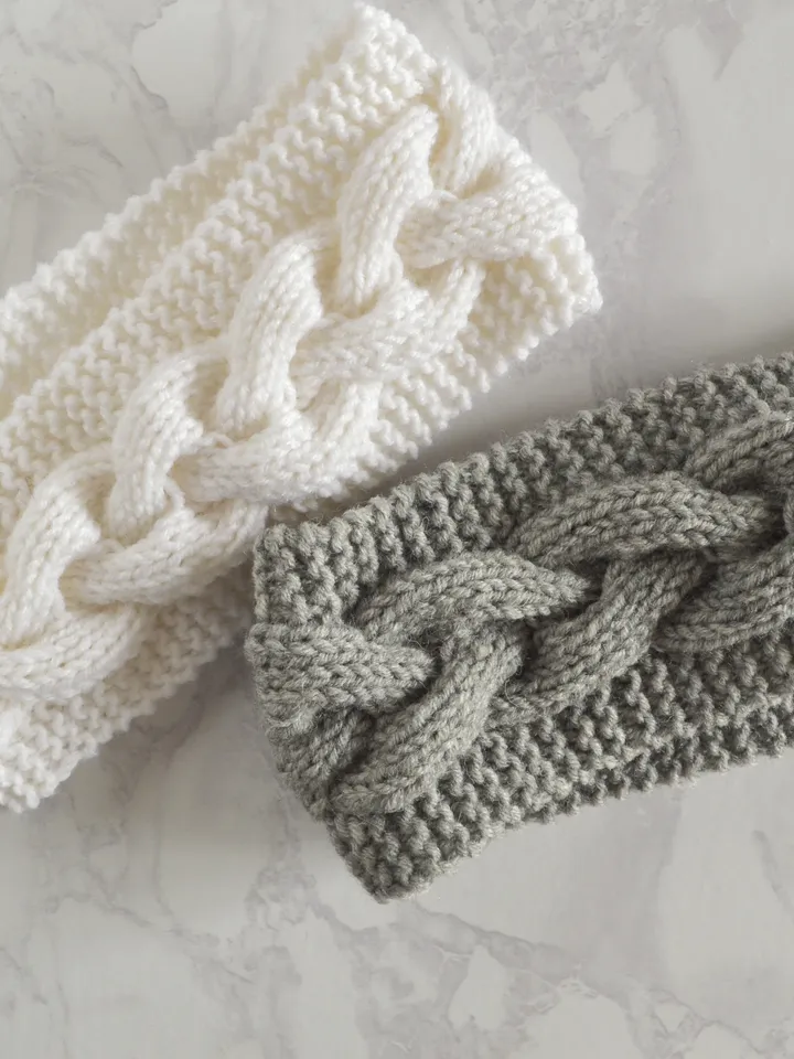 Knitted headband in gray with braid pattern