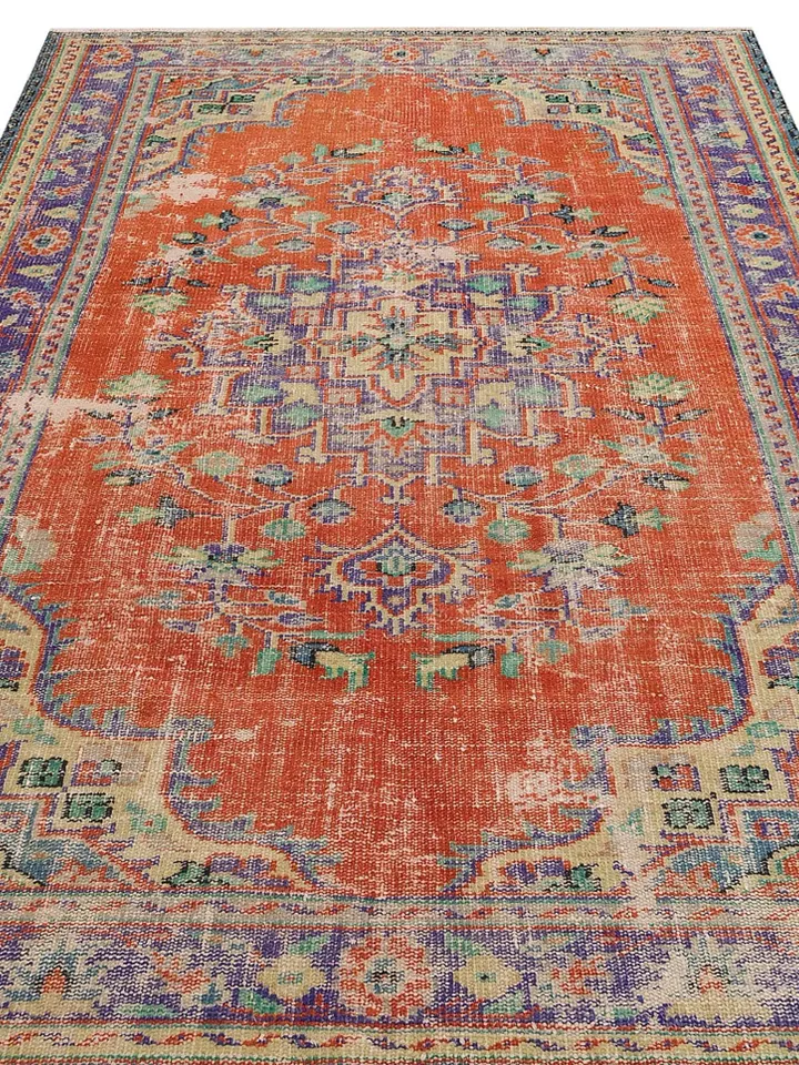 Add a pop of color to your living room with this stunning Orange Turkish Rug