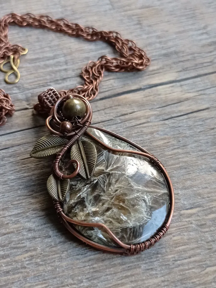 A catchy fancy pendant with a rare stone, an anniversary gift, a gift to yourself. Pendant for a dresses occasions