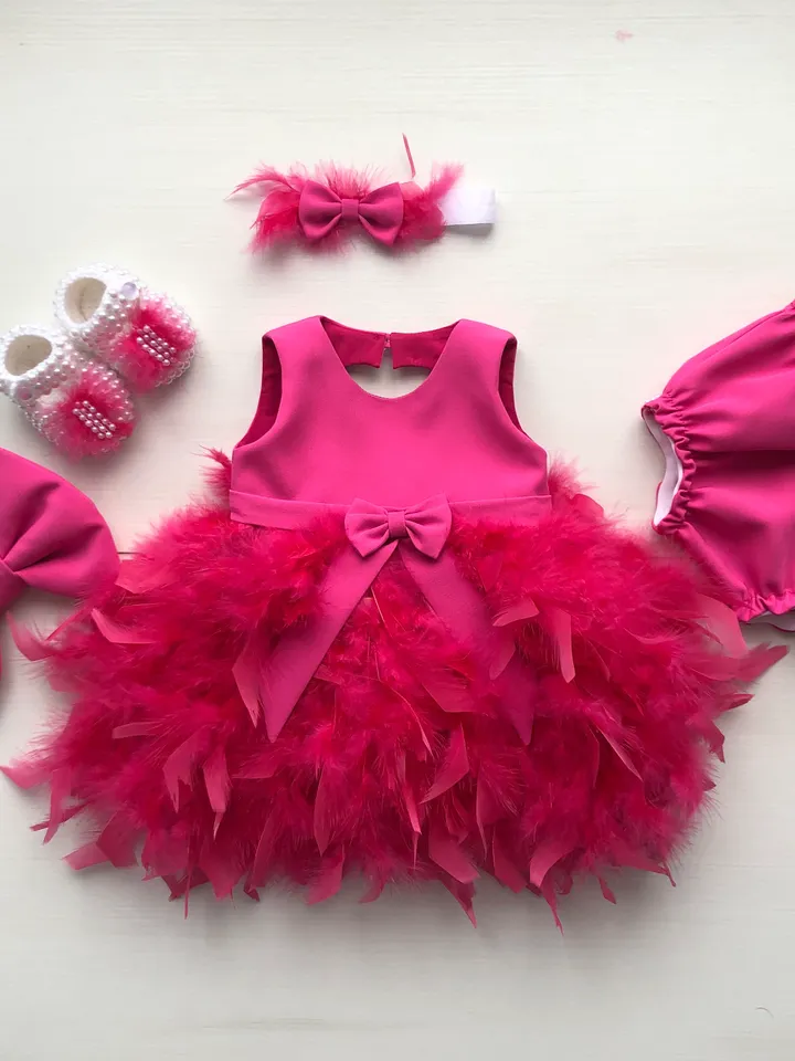 Fuchsia dress with feathers and pearls, booties, panties and headband. First birthday dress. Flower girl dress. Take home outfit for girl.