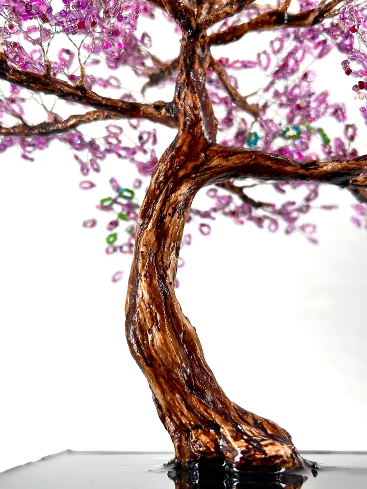 Handmade artificial tree with a curved trunk