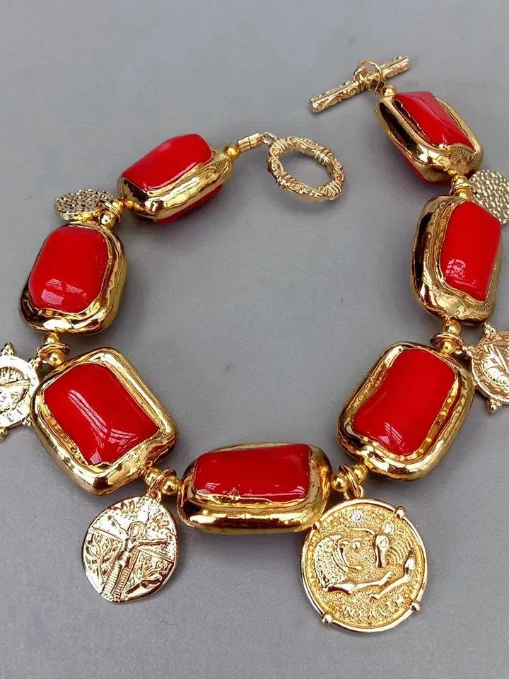 Luxurious Chunky Red Coral Bracelet with 18k Gold Plating and Dangling Greek Charms