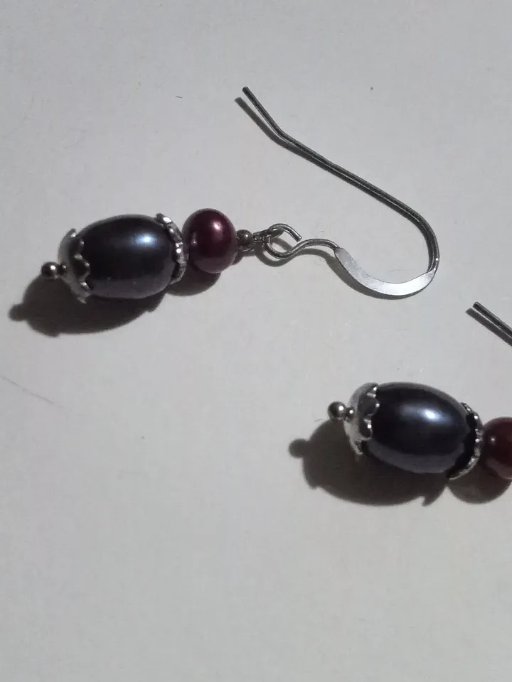 Sterling silver earrings with natural pearls