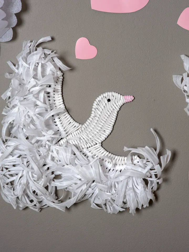 Two white doves handmade. Hanging birds with white raffia for wall decor.