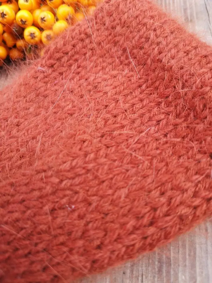 Warm, soft and fluffy women twisted headband, red bricks colour, made from natural, quality yarn.