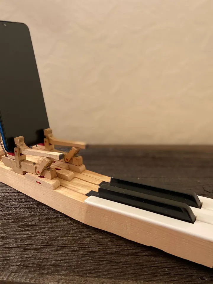 Phone stand made from old piano keys
