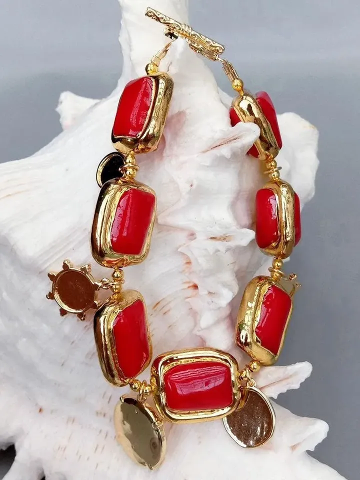Luxurious Chunky Red Coral Bracelet with 18k Gold Plating and Dangling Greek Charms