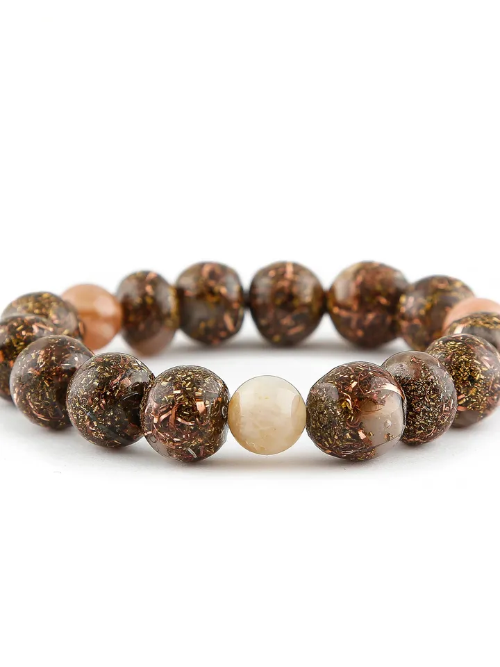 Orgonite rose gold sunstone, solar energy, solar plexus chakra bracelet. The power of sunstone is increased with incense and Tibetan bowls.