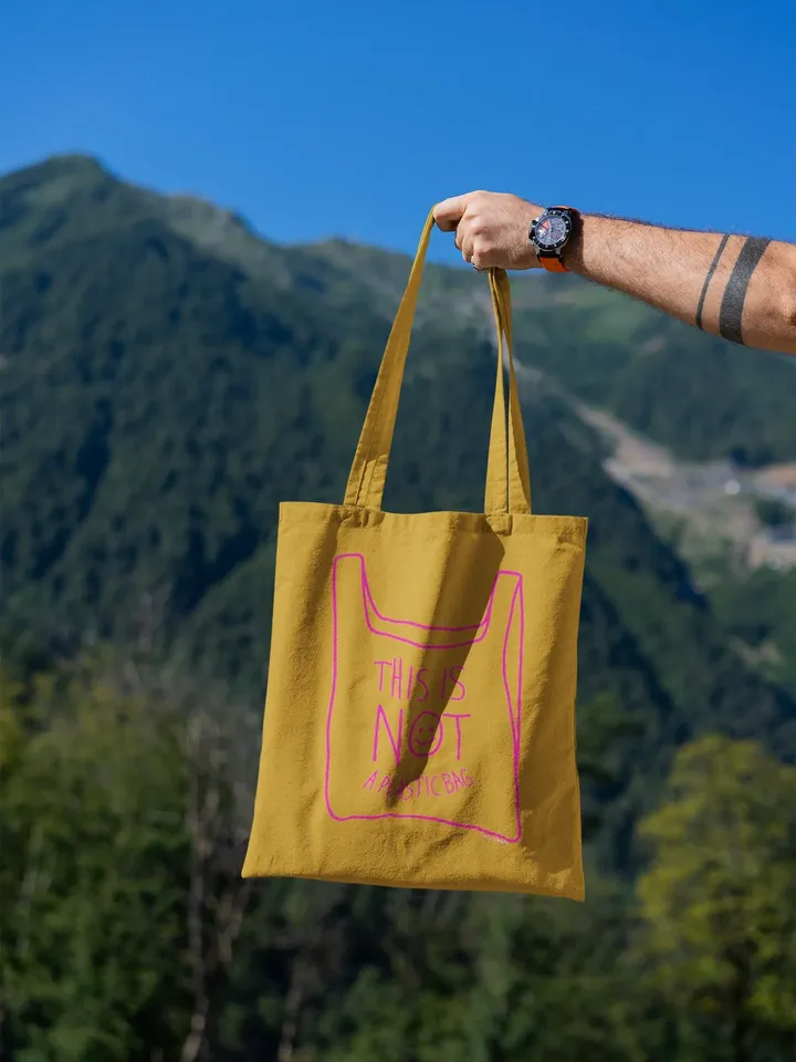 NOT A PLASTIC tote Mustard is a eco vegan friendly reusable grocery bag, market bag, gym bag. Say No to Plastic with this anti plastic tote.