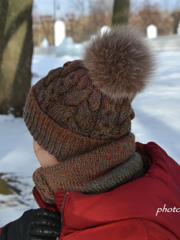 Set of knitted accessories hat with fur pompom and snood