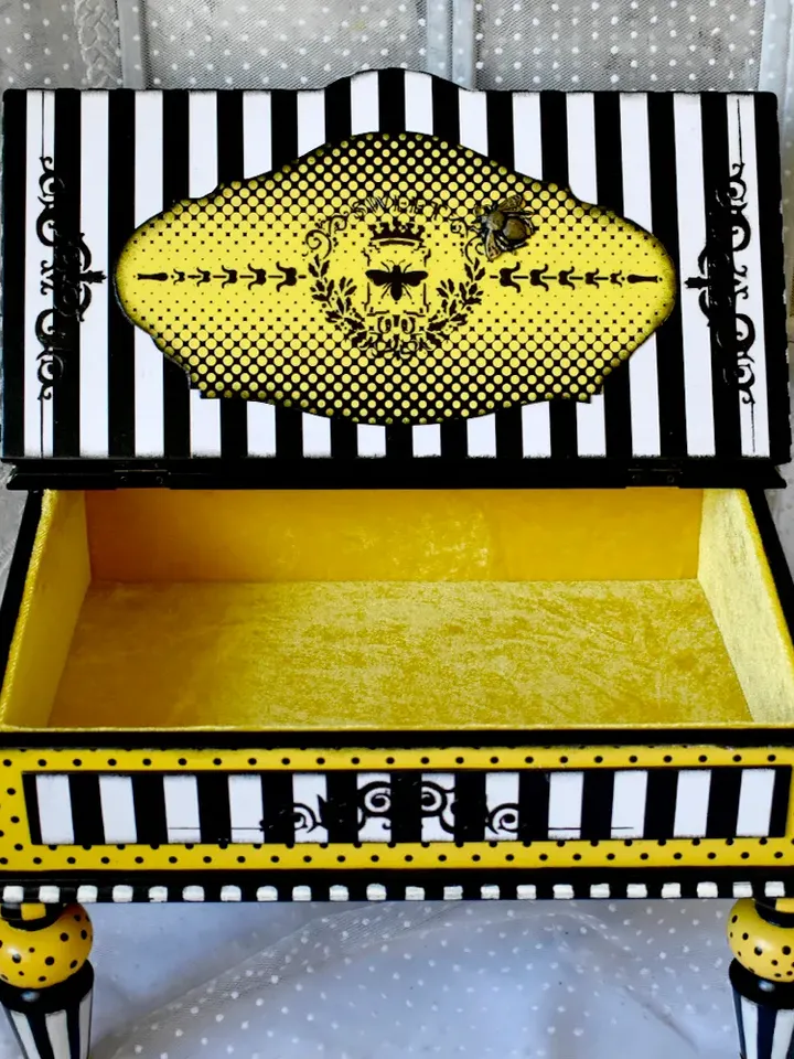 Bureau for papers and documents in black-white-yellow color