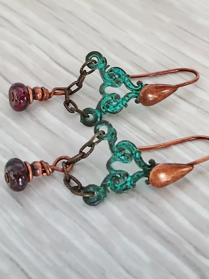 Boho Shabby chic Vintage style solid and natural copper earrings Textured patinated with a garnet bead and chain