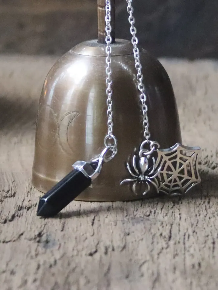 Arachne's Pendulum, Black Onyx Pendulum with Web and Spider, Silver Toned Black Pendulum for Dowsing, Spider Themed Pendulum