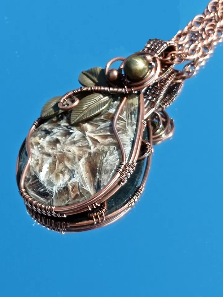 A catchy fancy pendant with a rare stone, an anniversary gift, a gift to yourself. Pendant for a dresses occasions