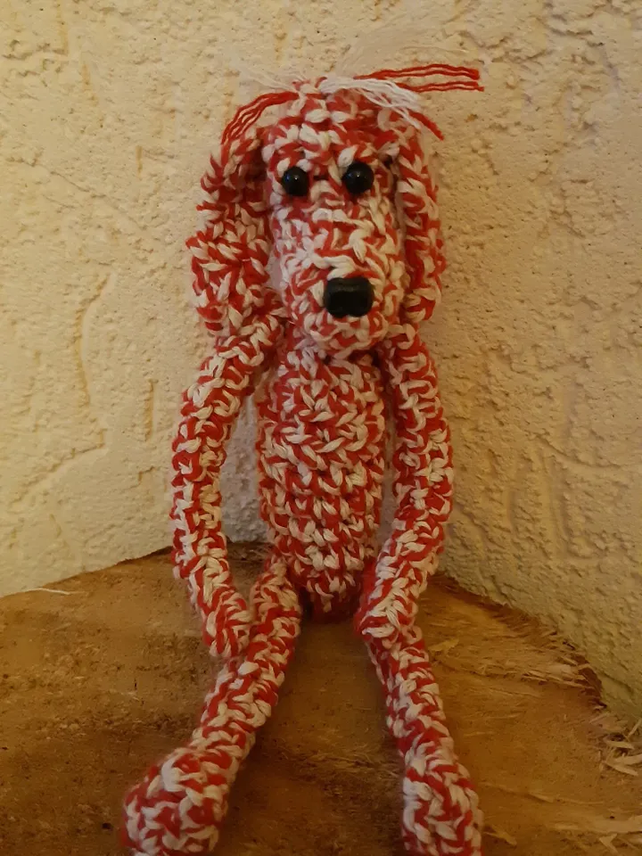 Fantasy crochet doggy, glass eyelets, plastic cream, melee