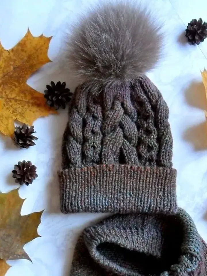 Set of knitted accessories hat with fur pompom and snood