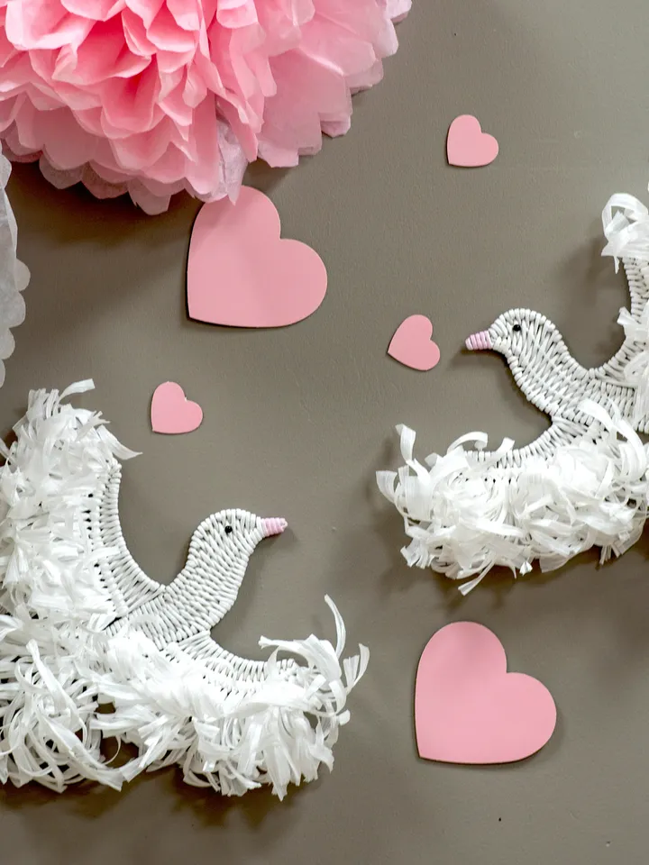 Two white doves handmade. Hanging birds with white raffia for wall decor.