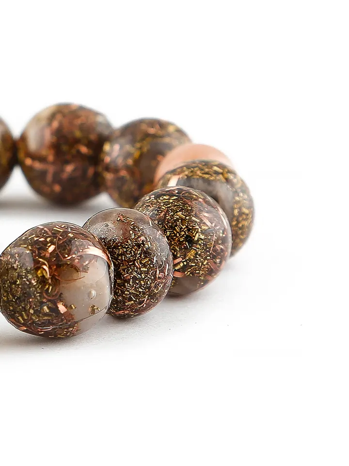 Orgonite rose gold sunstone, solar energy, solar plexus chakra bracelet. The power of sunstone is increased with incense and Tibetan bowls.